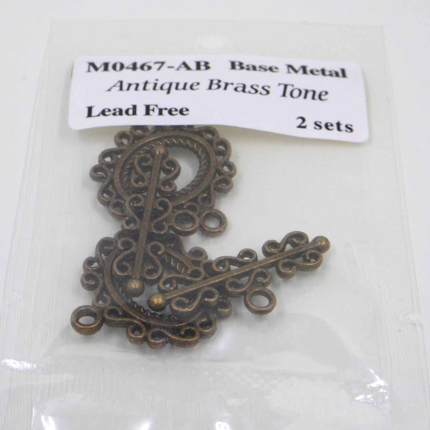 Scroll Frame Toggle Clasp Antique Brass Tone