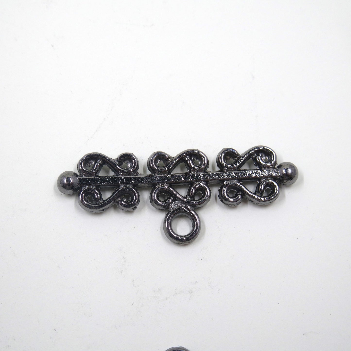 Scroll Frame Toggle Clasp Gunmetal Tone