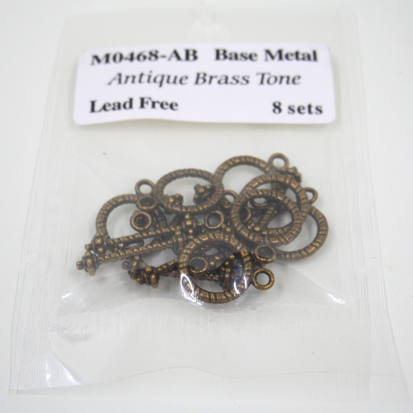 Textured Circle Toggle Clasp Antique Brass Tone