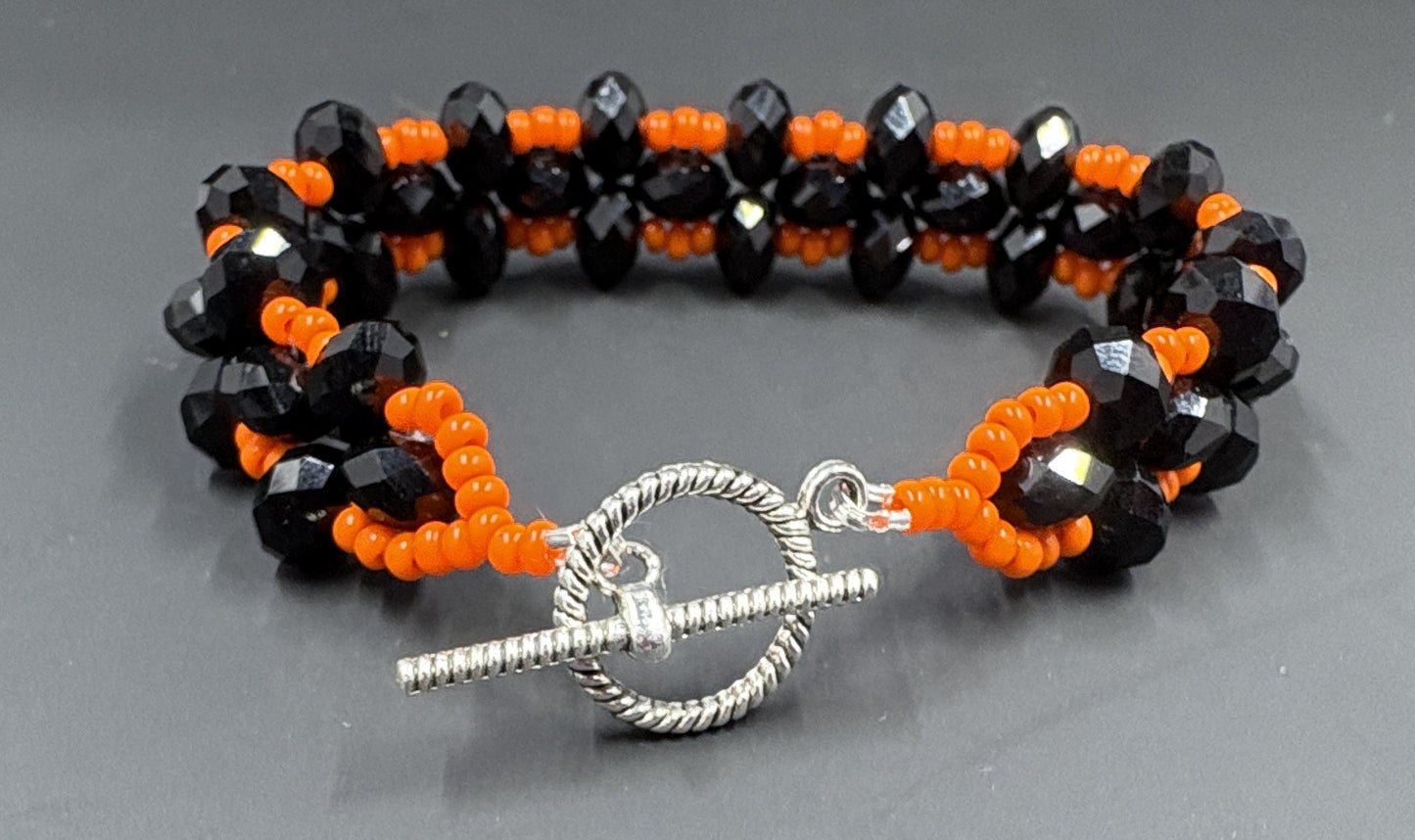 Black Crystal Orange Bead Bracelet
