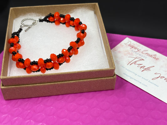 Orange Crystal Black Bead Bracelet
