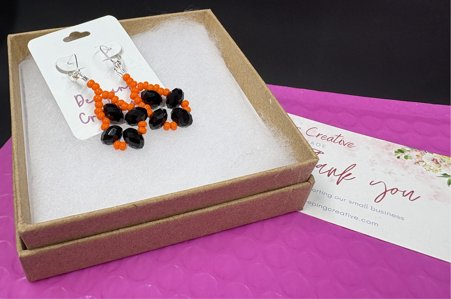 Black Crystal Orange Bead Earrings