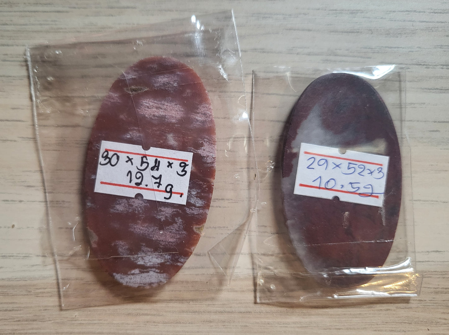 TWO Oval Shaped and Polished Stones