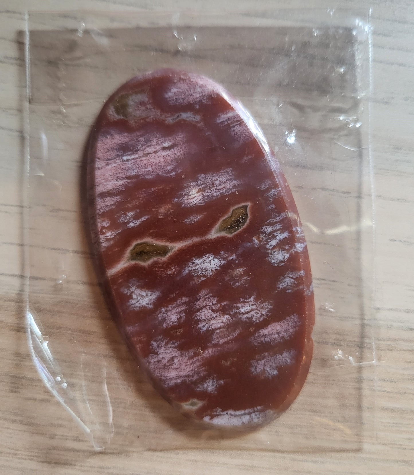 TWO Oval Shaped and Polished Stones