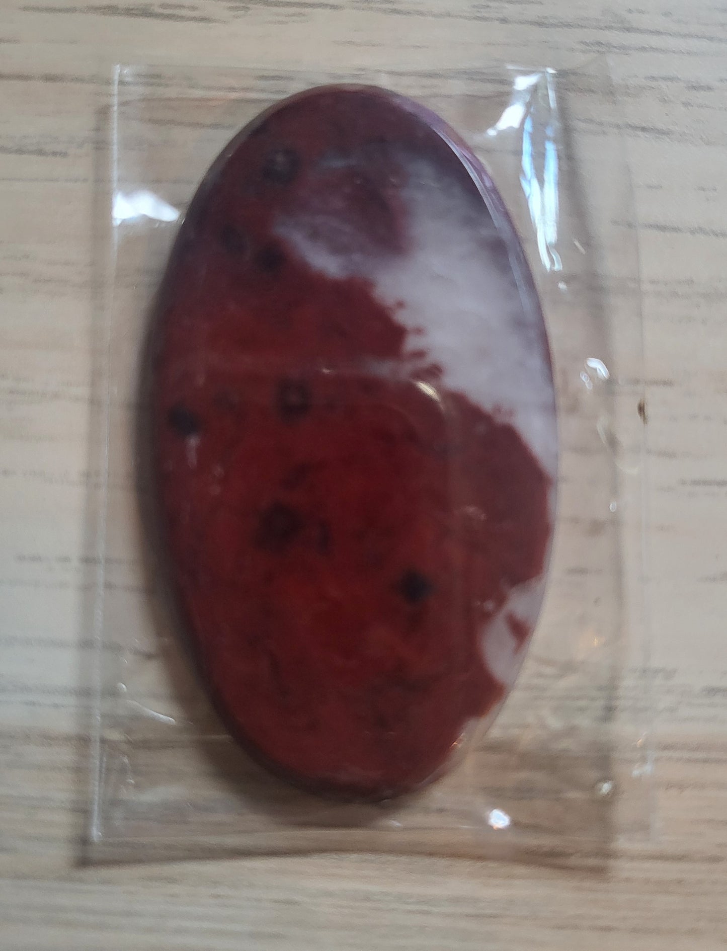 TWO Oval Shaped and Polished Stones