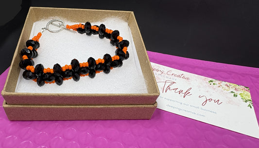 Black Crystal Orange Bead Bracelet